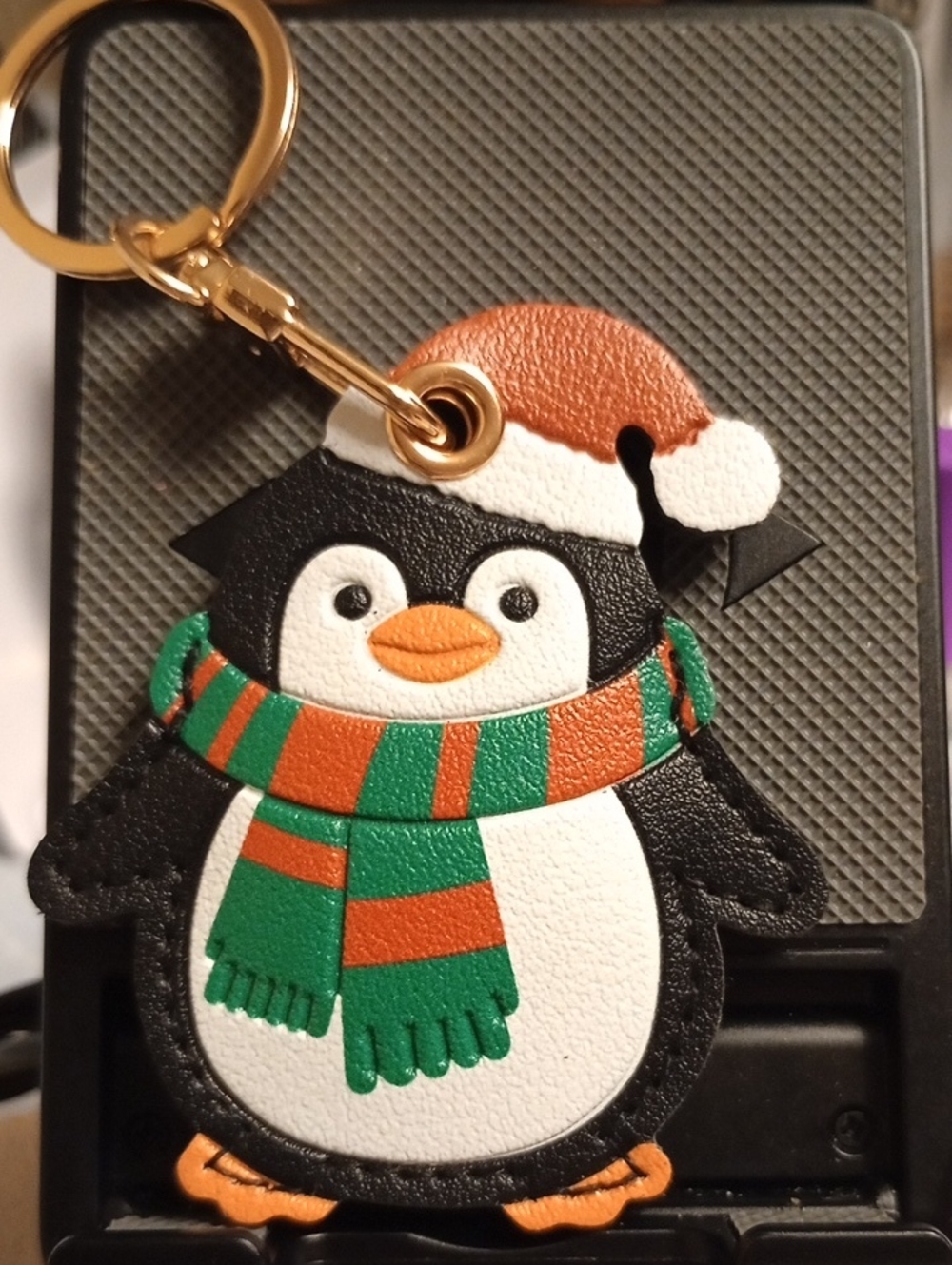 Air Tag Holder festive Penguin Keychain Accessory in Black, White & Orange